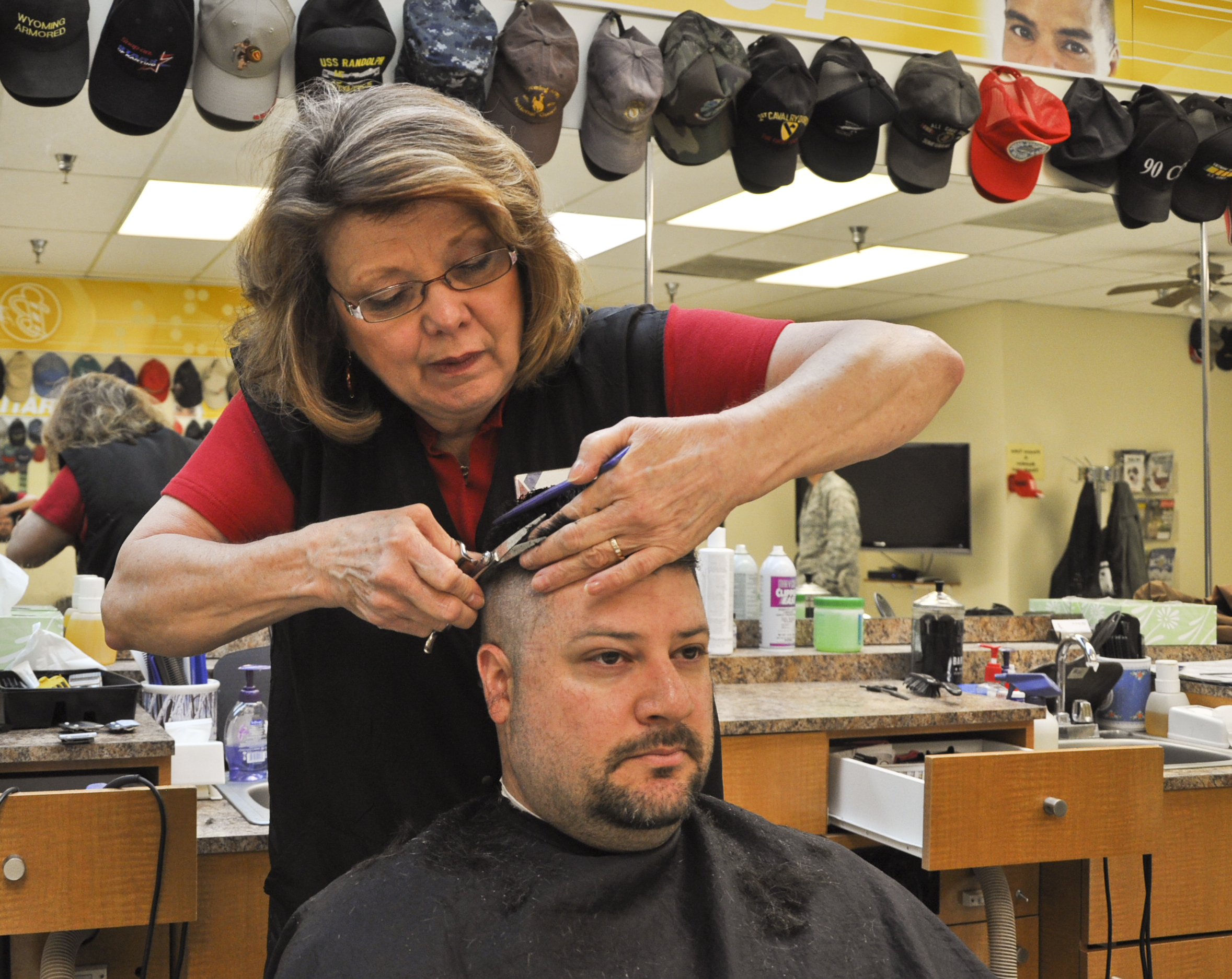 File:Barber makes cut.JPG